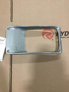 International 4900 Left Headlight Bezel