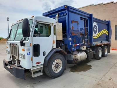 2015 Peterbilt 320 with McNeilus ZR 28 Cubic Yard Box, Side Load