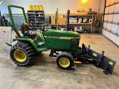 1995 John Deere 670 with Deck and Snowplow