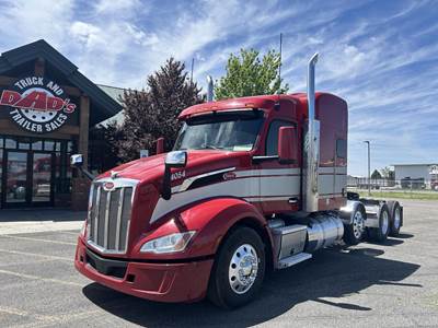 Peterbilt 579 Tri Axle Sleeper Semi Truck - Mid Roof Sleeper, Cummins 500HP, 13 Speed Manual