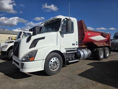 Volvo VNL64300 Dump Truck - D13 405HP, 12 Speed I Shift Automatic, 15' Dump