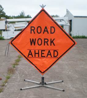 Traffic Control Signs / Equipment Lot-- Road Work Ahead (2), Right Lane Closed (1), Lane Closed (1), Stop/Slow Paddles (2)
