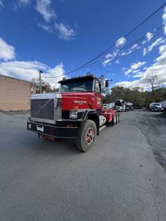 Volvo ACL64 Tri Axle Roll Off Truck - Cummins, 450HP, 8Ll Manual