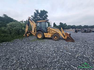2006 John Deere 710C Backhoe - Indeco HP1800 Hammer
