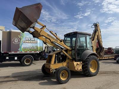 New Holland 555E Backhoe