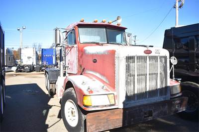 Peterbilt 377 Tandem Axle Cab & Chassis Truck - Cummins, 400HP, 9 Speed Manual