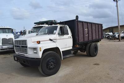 Ford F-700 Single Axle Dump Truck - 210HP, 5+2 Speed Manual, 14' Dump