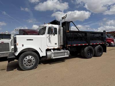 Freightliner FLC Dump Truck - Caterpillar 400HP, 13 Speed Manual, 15' Dump
