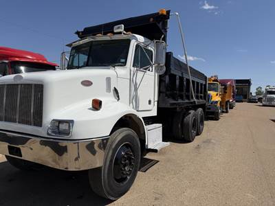 Peterbilt 330 Dump Truck - Caterpillar 300HP, 8Ll Manual, 15' Dump