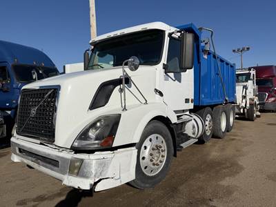 Volvo VNL64T300 Dump Truck - D12 465HP, 8Ll Manual, 16' Dump