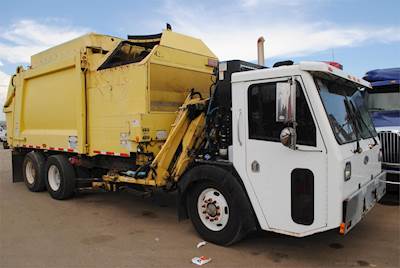 Crane Carrier (CCC) Low Entry Tandem Axle Garbage Truck - Cummins, 330HP