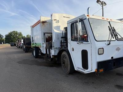 Crane Carrier (CCC) Low Entry Single Axle Side Load Garbage Truck - Cummins, 300HP, Automatic