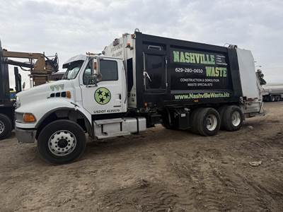 Sterling Acterra 8500 Tandem Axle Garbage Truck - Caterpillar, 300HP, Automatic