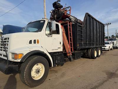 Sterling L9500 Tandem Axle Grapple Truck - Caterpillar, 400HP, 8Ll Manual