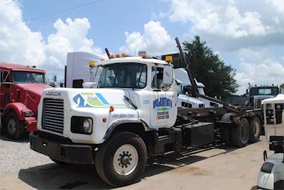 Mack DM688S Roll Off Truck - E-7, 350HP, 9 Speed Manual