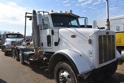 Peterbilt 365 Tri Axle Roll Off Truck - Cummins, 450HP, 8Ll Manual
