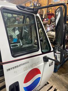 #1107 2003 International 4400 Door passenger