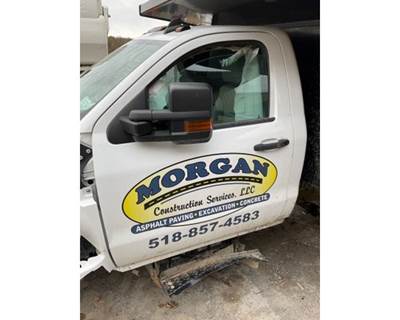 Chevrolet C5500 Left Front Door Assembly for a GMC C5500