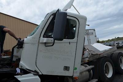 Freightliner Columbia 120 Left Front Door Assembly for a Freightliner COLUMBIA