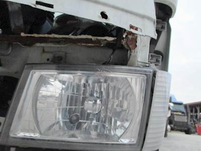 Mitsubishi FE-SP Left Headlight Assembly for a Mitsubishi Fuso FE-SP