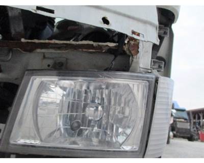 Mitsubishi FE-SP Left Headlight Assembly for a Mitsubishi Fuso FE-SP