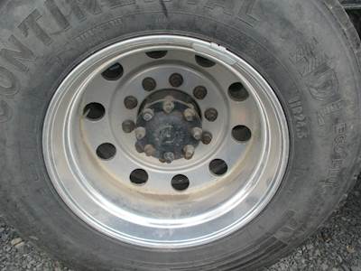 Caterpillar CT660 Tire & Rim for a CAT CT660