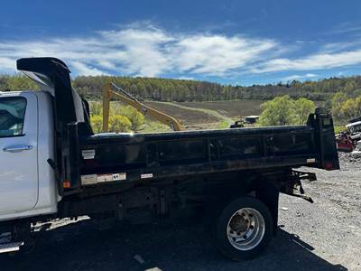 11' RUGBY DUMP WITH SUB FRAME ELECTRIC OVER HYDR