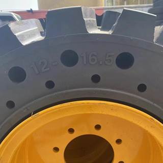 2023 Skid Steer Solid Tire With Rim 12x16.5. Universal Fit.