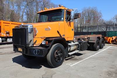 1990 WhiteGMC ACL Roll Off Truck