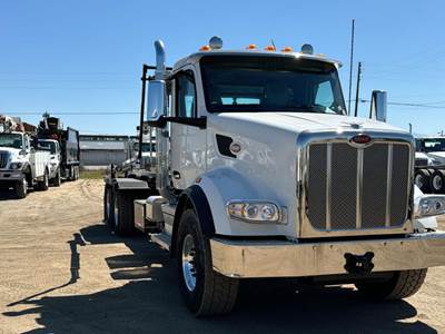 Peterbilt 567 Roll Off Truck - Cummins, 450HP
