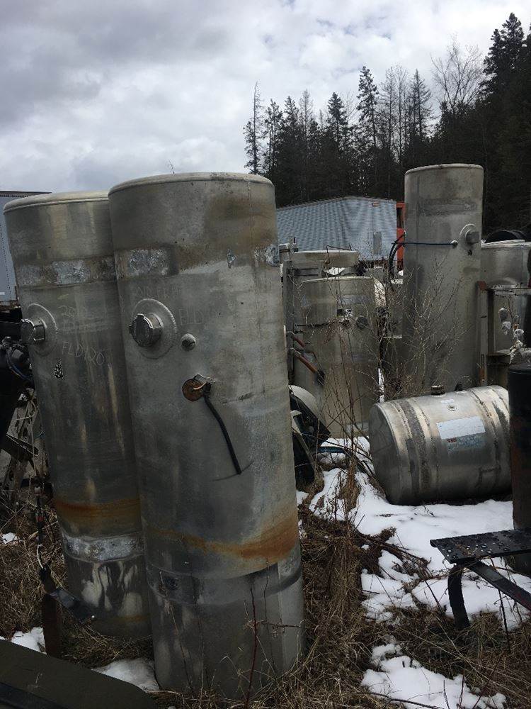 Several Fuel Tanks Of Various Sizes, Dimensions And Truck Applications