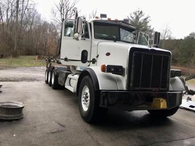 Peterbilt 357 Tri Axle Roll Off Truck - Caterpillar, 400HP, 8Ll Manual
