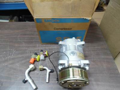 SANDEN SD508 MODEL 9570 AC COMPRESSOR. NEW SURPLUS(NOS). EAR MOUNT 119MM 7