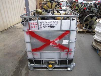 PLASTIC CONTAINER OF VARIOUS FUEL FILTER HOUSINGS 
QTY: 82 