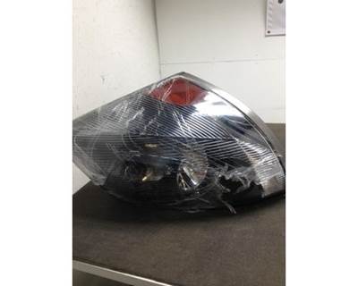 Volvo VN Left Headlight Assembly