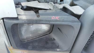 Ford F-550 Right Headlight Bezel for a Ford F550SD (SUPER DUTY)