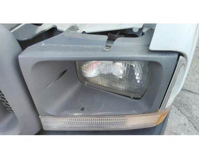 Ford F-550 Left Headlight Bezel for a Ford F550SD (SUPER DUTY)