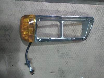 Freightliner Left Headlight Bezel