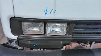 GMC T7500 Right Headlight Bezel
