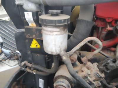 International ProStar Left Power Steering Reservoir for a International PROSTAR 113