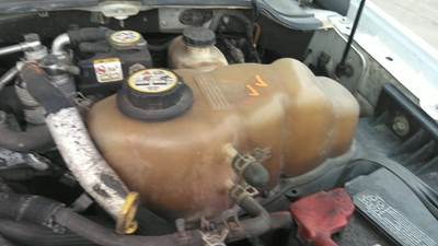 Ford F-550 Radiator Overflow Bottle / Surge Tank for a Ford F550SD (SUPER DUTY)