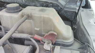 Ford F-550 Left Radiator Overflow Bottle / Surge Tank for a Ford F550SD (SUPER DUTY)