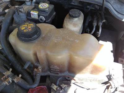 Ford F-550 Left Radiator Overflow Bottle / Surge Tank for a Ford F550SD (SUPER DUTY)