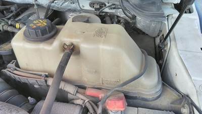 Ford F-550 Left Radiator Overflow Bottle / Surge Tank for a Ford F550SD (SUPER DUTY)