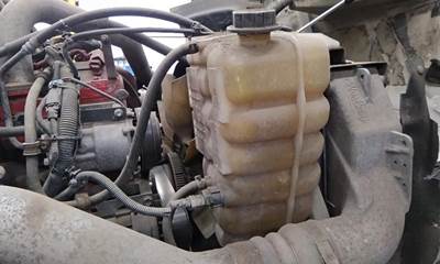 International ProStar Radiator Overflow Bottle / Surge Tank for a International PROSTAR 122