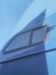 International 9400i Left Sleeper Window