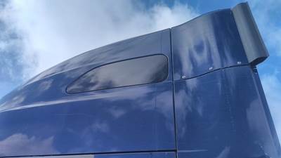 International LT Left Sleeper Window