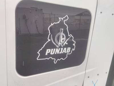 International LT Left Sleeper Window