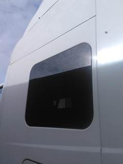 International LT Left Sleeper Window