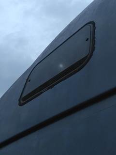 Volvo VNL Left Sleeper Window